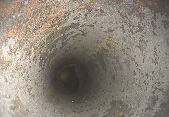 View on the IPLEX GT videoscope LCD screen of the interior of a steam boiler tube 